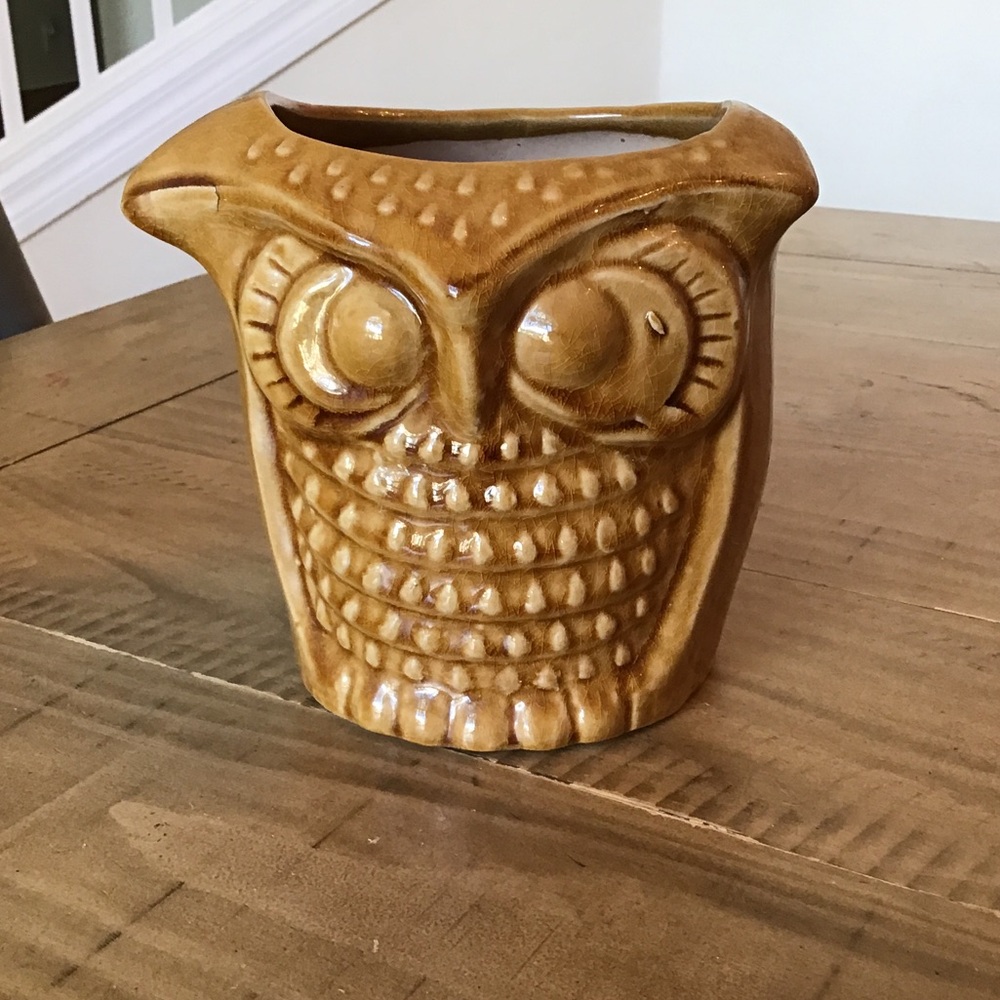 Vintage ND Exclusive owl-shaped planter.